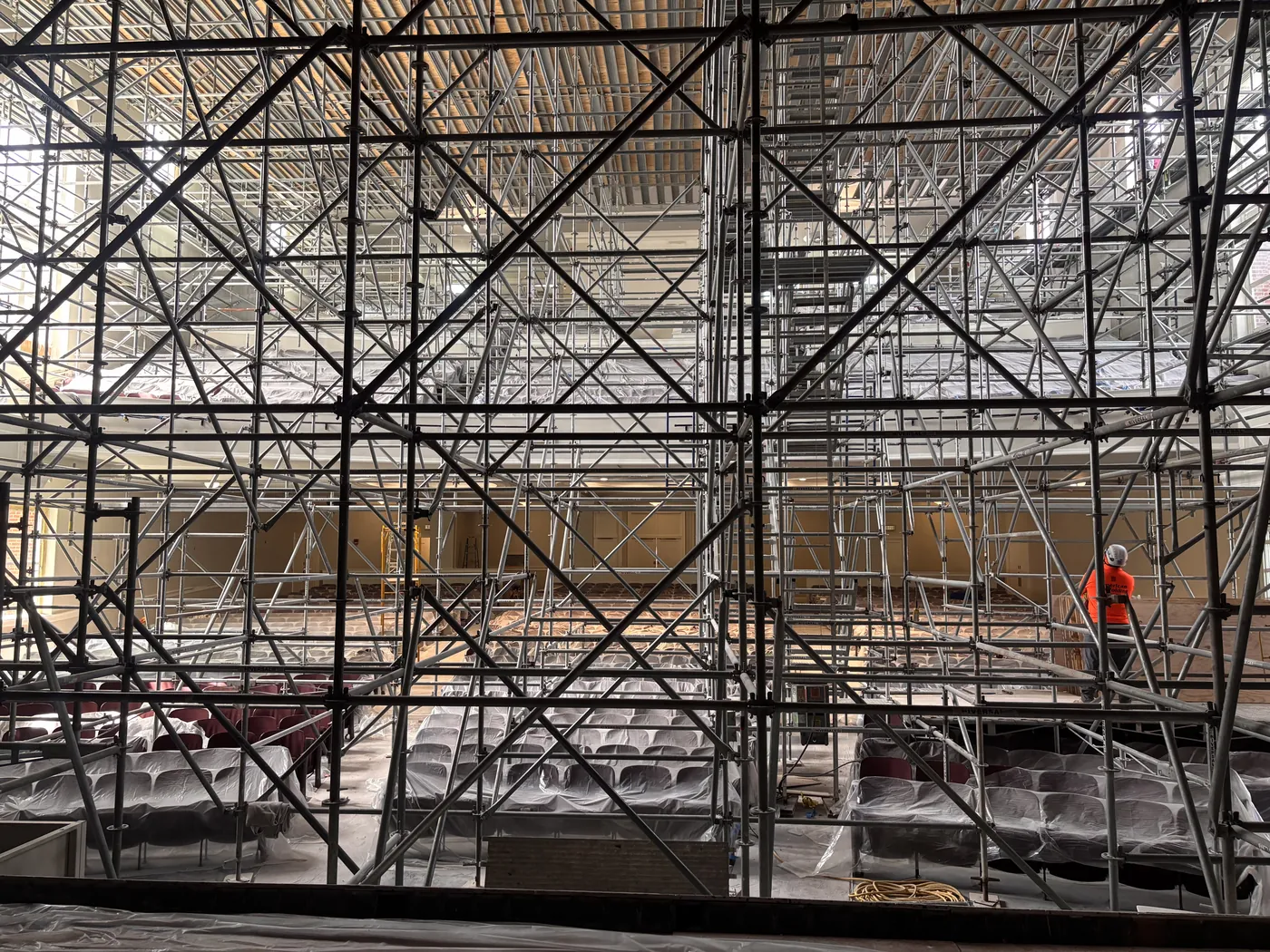 University auditorium before Bee Clean post-construction cleanup